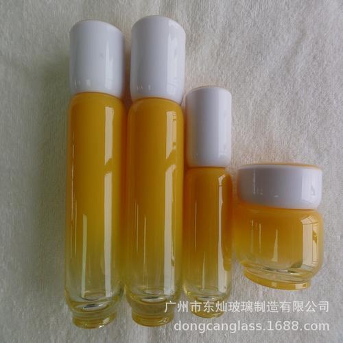 黄色渐变精油水乳霜套装玻璃瓶 厂家热销背后的包装美学与市场逻辑